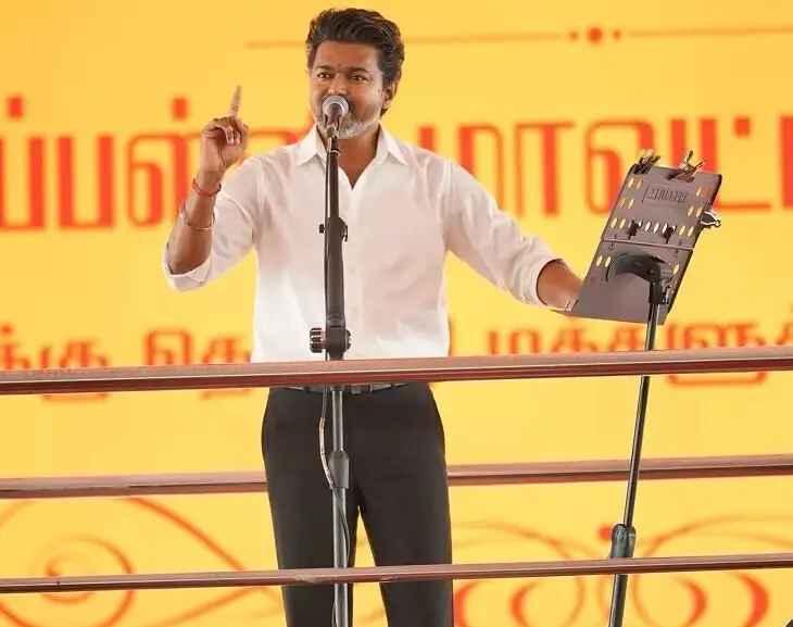 tn-cm-vijay-black-and-white-suit-controversy-tiruchi-speech
